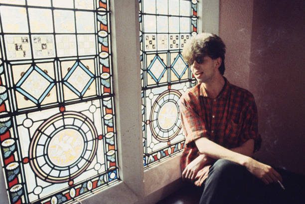 A scene from the Channel 4 program Playing At Home. Ian sat on the staircase at the bands home in Sefton Park Aigburth Liverpool. (Photo by Kevin Cummins/Getty Images).
